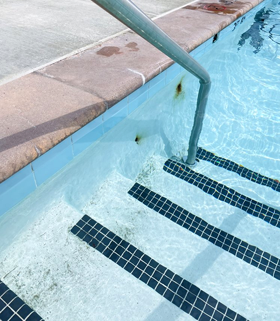 Pool before repair with visible damage